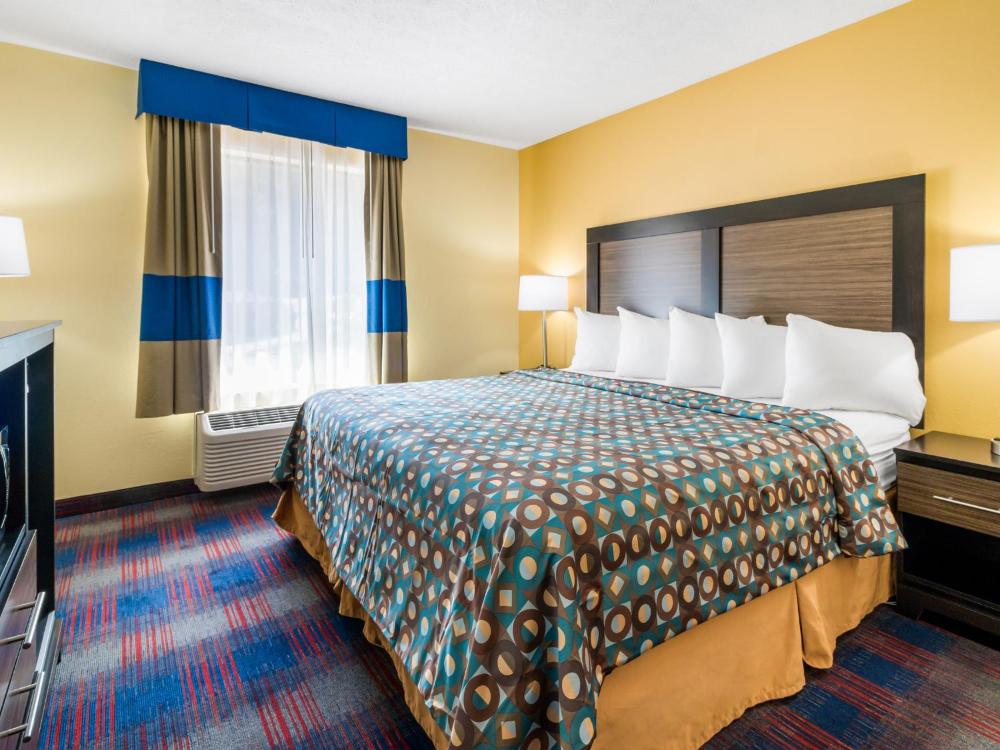 One King Bed One Double Bed Suite interior